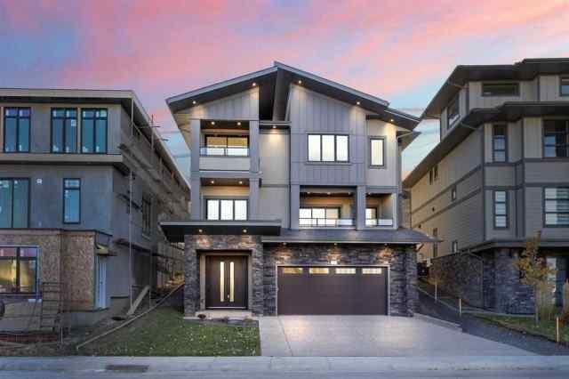 Hillside homes with river valley views in Patterson, Calgary